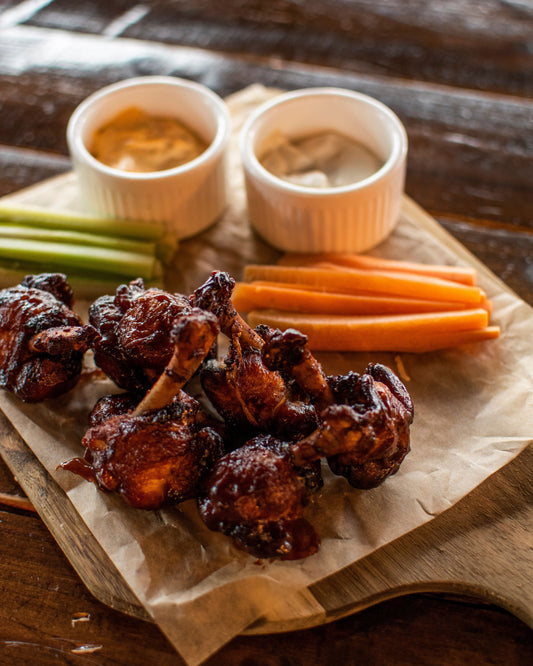 Chicken wings tossed in Ark Pepper CO. Smoked Brown Sugar Seasoning.